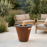 Arteflame grill patio scene with three surrounding lounge chairs