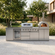 Blazon outdoor kitchen island on a landscaped residential terrace