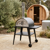 Closed Pizzi oven with sauna and cold tub in the background
