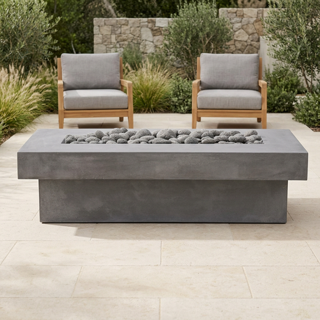 Grey Terraza concrete fire table on a landscaped outdoor terrace