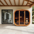 Sauna and sliding glass door side by side along the same patio wall