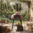 The Red Rock 100 wood-fired oven closed and not in use in a realistic outdoor patio setting