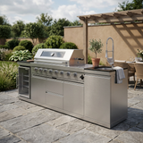 Three-quarter lifestyle view showing the sink and faucet side of the grill island