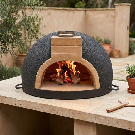Tonío brick pizza oven action shot with a contained wood fire and no food inside