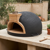 Tonío pizza oven in a natural outdoor patio setting